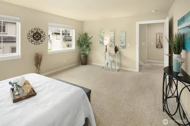 Another view of the primary bedroom.