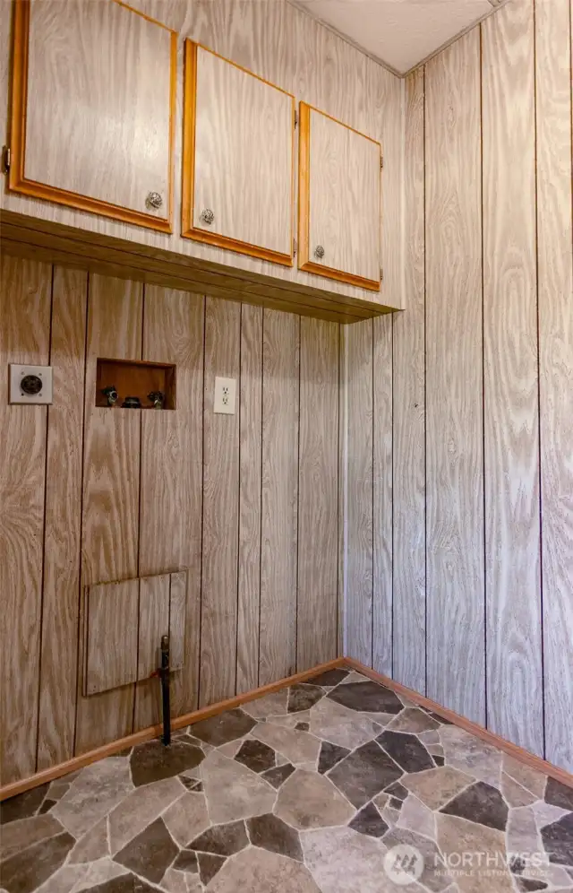 Convenient laundry room is just off the kitchen.