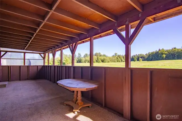 Enjoy lots of outdoor living in this breezy covered back deck!