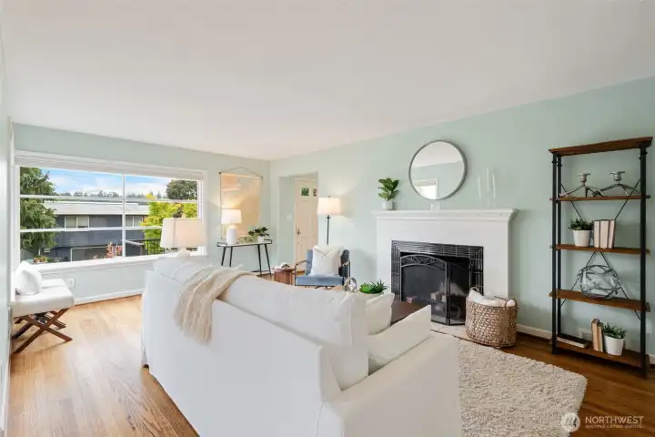 Lovely entry with storage and coat closet invites you into the warmth of this spacious living room