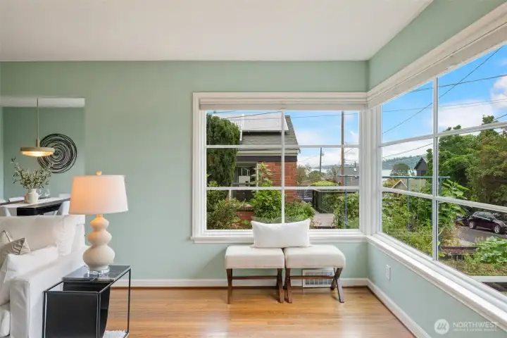 View of Lk WA and verdent greenery from these enormous corner windows
