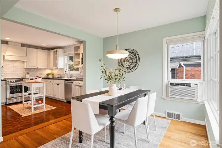 Talk to your dinner guests while cooking in the kitchen...and AC unit comes with the house