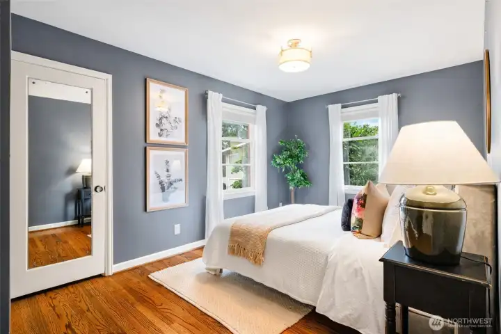 One of 3 bedrooms in the home.  This one on the main level.  This bed is a queen...but big enough for a king