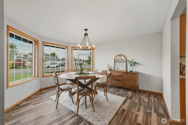 Another view of the lovely dining room, with the kitchen through the doorway to the right.