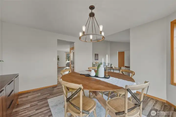 Updated light fixtures appoint both this formal dining room, and also the informal dining space off the kitchen (which you'll get to see in the photos that follow).