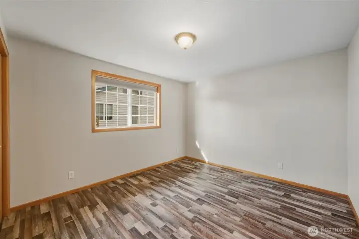 Another view of bedroom #3. This home has LVP flooring throughout.