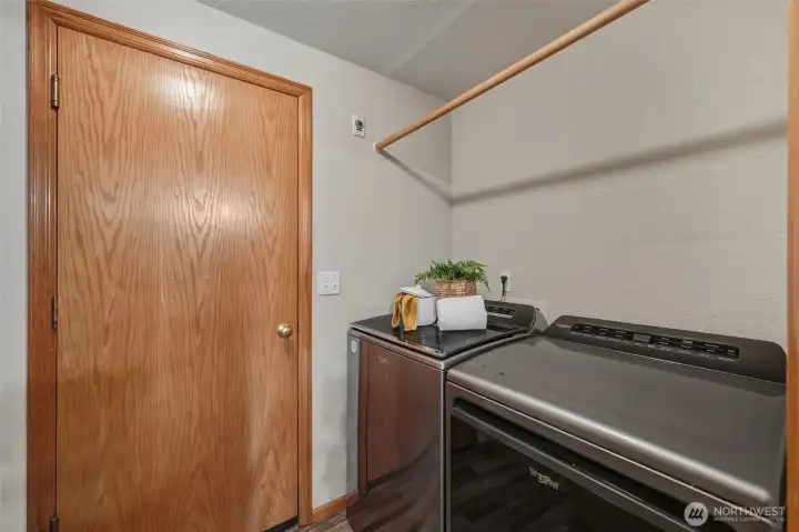 Here is the laundry room, looking toward the door to the large 2-car garage.