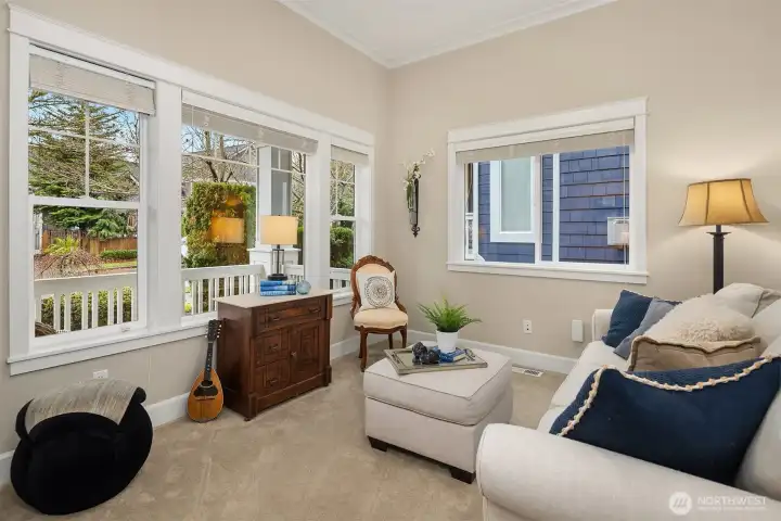 Front room with french doors could be a music studio, home office or another gathering place