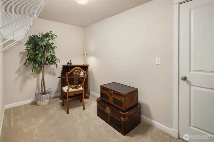 An extra room large enough to be a writing studio or reading laire.