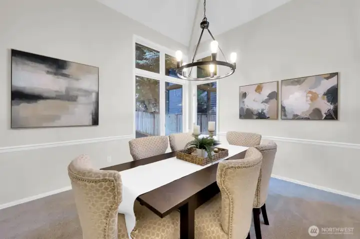 Nice Dining Room with tall vaulted ceiling.