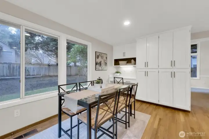 Large informal eating area. Work station and pantry cabinets.