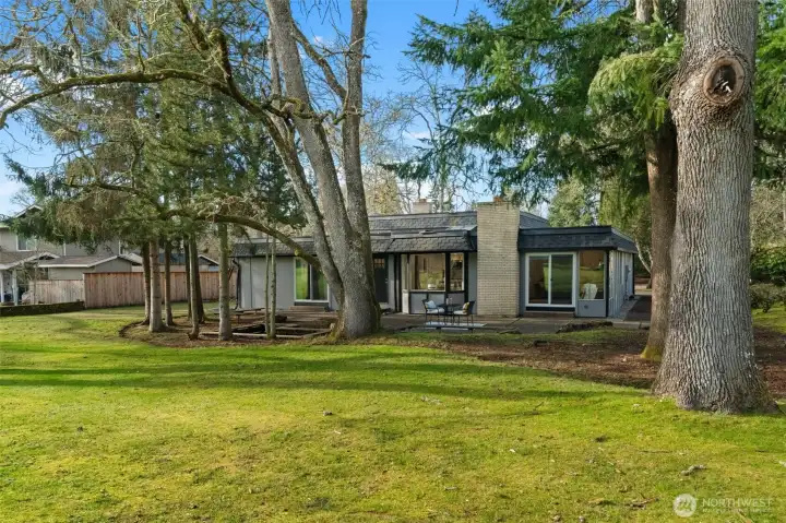 Such a beautiful home tucked back on the 12th green