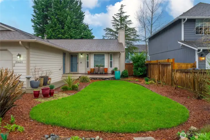 Beautifully landscaped front yard designed for low maintenance and lasting appeal.