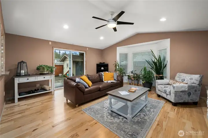 The family room opens to a delightful backyard retreat.