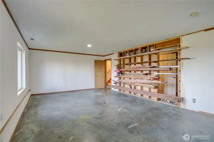 Airy shop with outside access in the lower level can be converted into 2 bedrooms or a studio!  let your imagination choose!