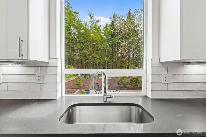 Kitchen sink situated to enjoy the private backyard