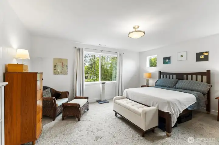 Large Primary bedroom tucked away at the back of the house for peace and quiet
