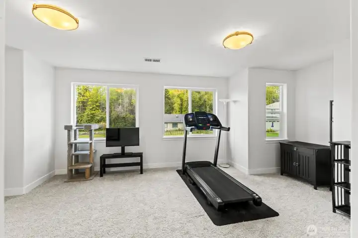 Flex space above the office currently used as an exercise room