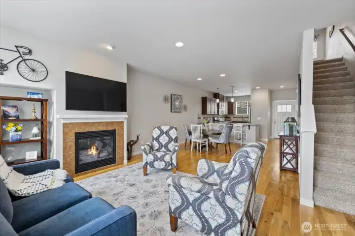 White painted wood mantle over fireplace