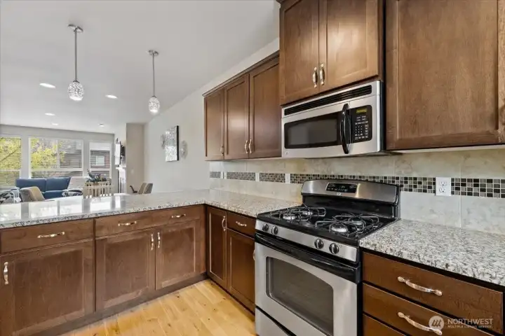 Java-stained maple cabinets and stainless-steel appliances