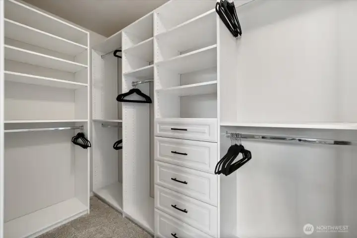 Fancy upgraded walk-in-closet w/wood shelving system