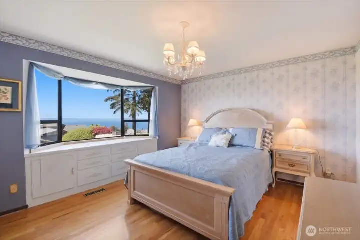 Primary bedroom suite with mountain & Puget Sound Views.