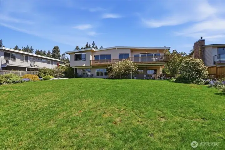 Huge back yard with mature landscaping.