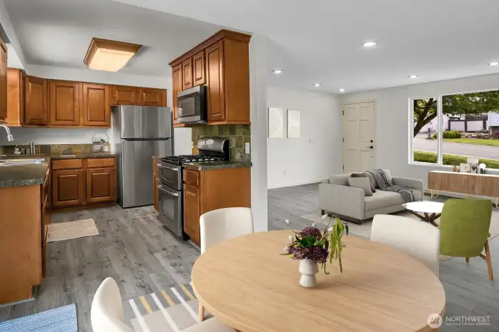 Bright kitchen with a spacious eat-in dining area perfect for everyday meals or entertaining Bright kitchen with a spacious eat-in dining area perfect for everyday meals or entertaining