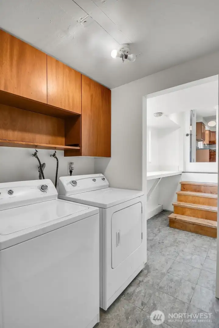 Utility room is located on the lower level (down five steps). This spacious area offers excellent potential for additional storage Utility room is located on the lower level (down five steps). This spacious area offers excellent potential for additional storage