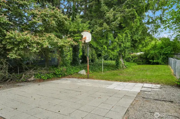 Enjoy a large, level lot featuring garden spaces, mature trees, a cozy firepit area, and an additional gated section with a level pad perfect for entertaining, projects, or creative possibilities. Enjoy a large, level lot featuring garden spaces, mature trees, a cozy firepit area, and an additional gated section with a level pad perfect for entertaining, projects, or creative possibilities.