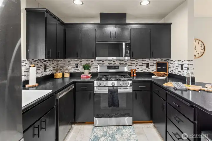 Kitchen with stainless steel appliances. Gas stove!
