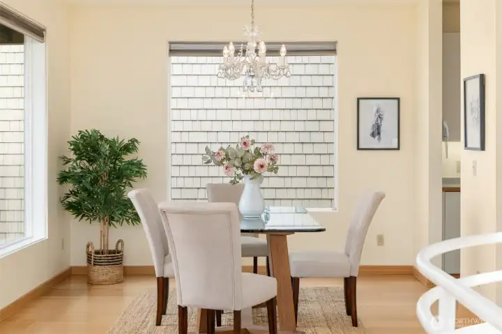 Dining area is conveniently located near the kitchen yet set apart perfect for entertaining and smaller gatherings.