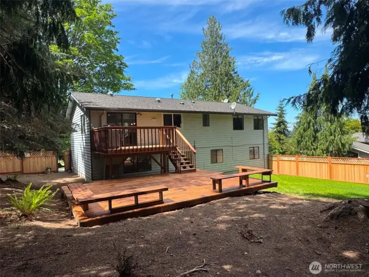 Nice size lower deck in addition to the upper deck for your backyard entertaining