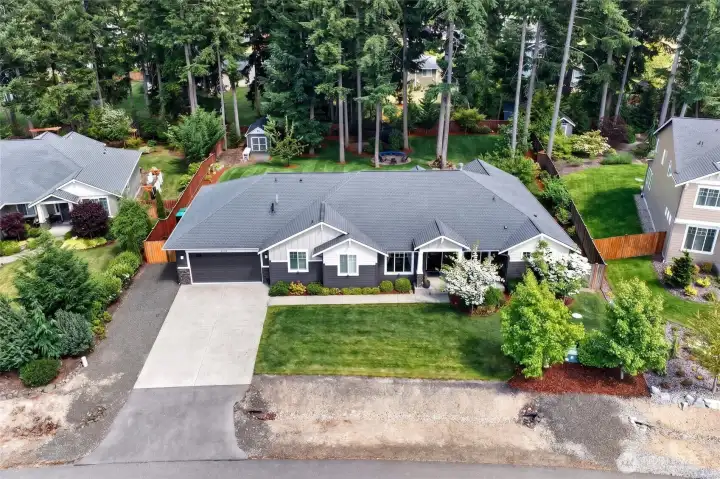 Beautifully maintained original-owner home situated on a spacious lot with exceptional privacy and outdoor living.