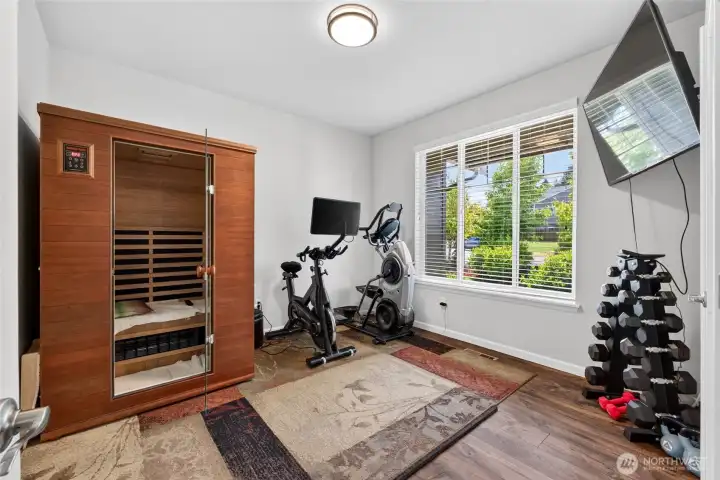 Versatile bonus room currently serves as a home gym and can easily function as an office, hobby room, or additional living space.