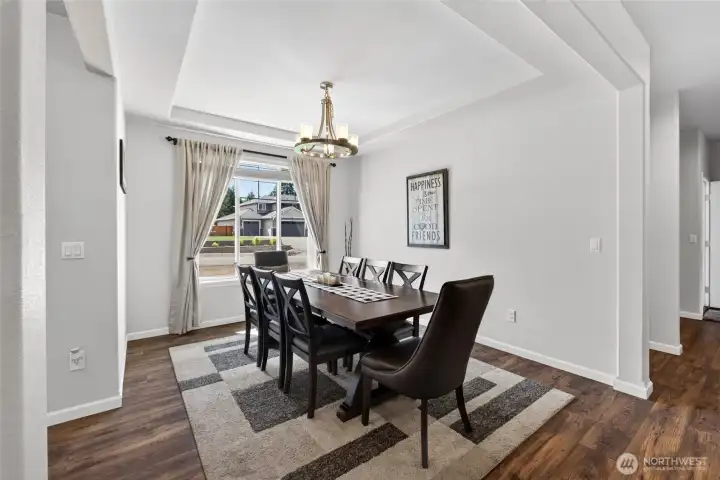 Elegant formal dining room provides the perfect setting for holiday gatherings, celebrations, and entertaining.