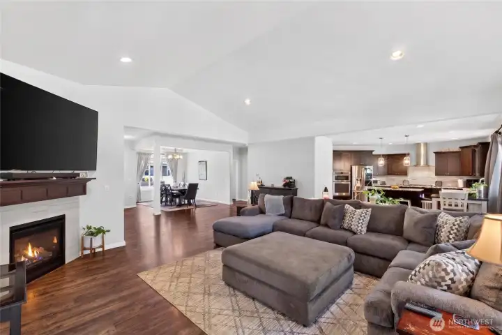 The heart of the home features generous living space, beautiful flooring, and effortless connection to the gourmet kitchen.