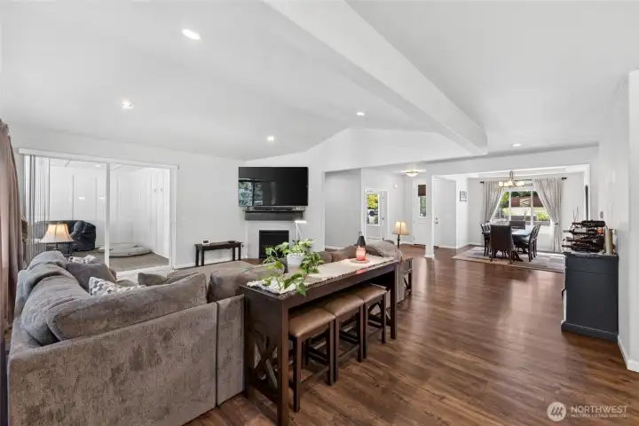 Expansive great room offers soaring ceilings, abundant natural light, and a welcoming atmosphere for family and guests.