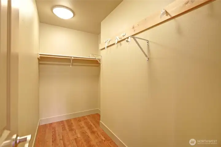 Primary walk-in closet Primary walk-in closet