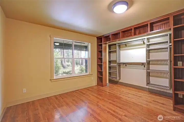 Guest bedroom w/ tons of built-in storage. Guest bedroom w/ tons of built-in storage.