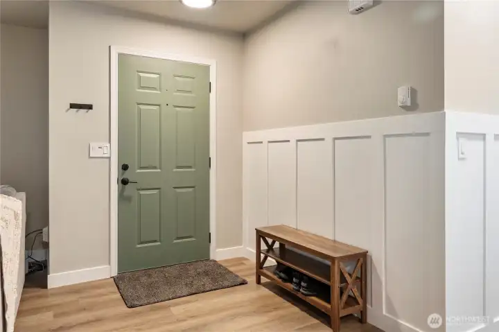Entry door with wainscotting entry way