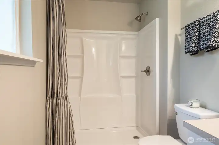 new 3/4 bath with walk-in shower for primary ensuite.