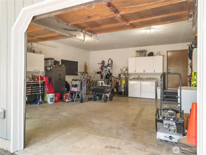 Garage is 2 bay plus shop area.  Very good size!