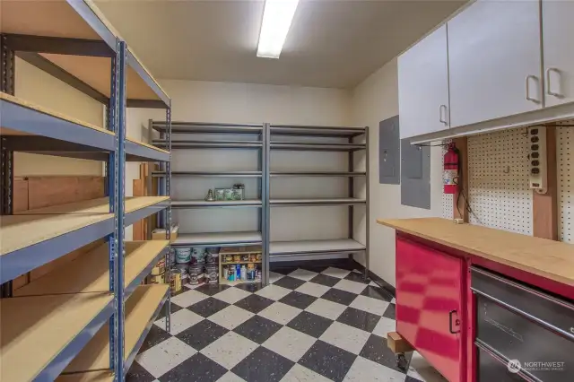 The large storage pantry includes a workbench for small projects.