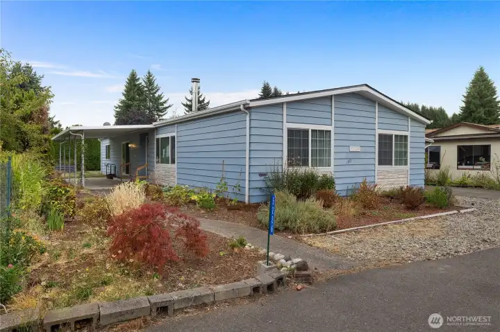 Meticulous landscaping surrounding home.