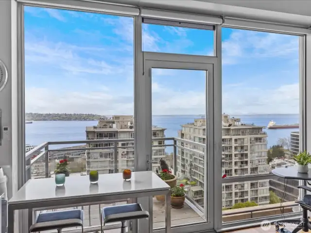 You will never tire of this view! Custom electronic blinds installed to keep the sun out when you're not home.