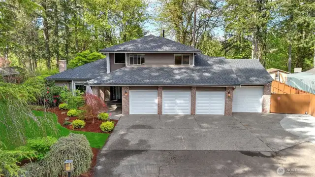 Additional features of this home include: Wired for Generator, 4th Bay Garage currently used as a shop, garden shed, RV parking.