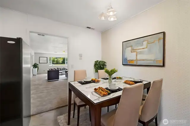 Cozy eating area adjacent to kitchen.