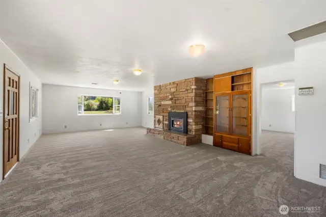 Main great room/living and dining room with built in china hutch.
