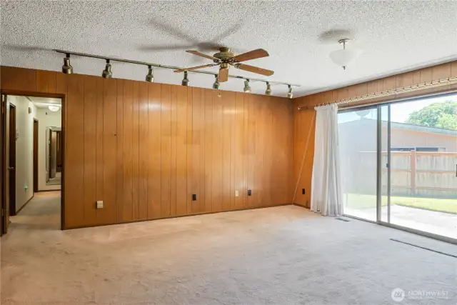 Large family room with slider to access the back yard